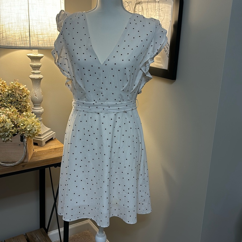 Favlux white flutter cap sleeve mini dress with black polka dots. Size Large